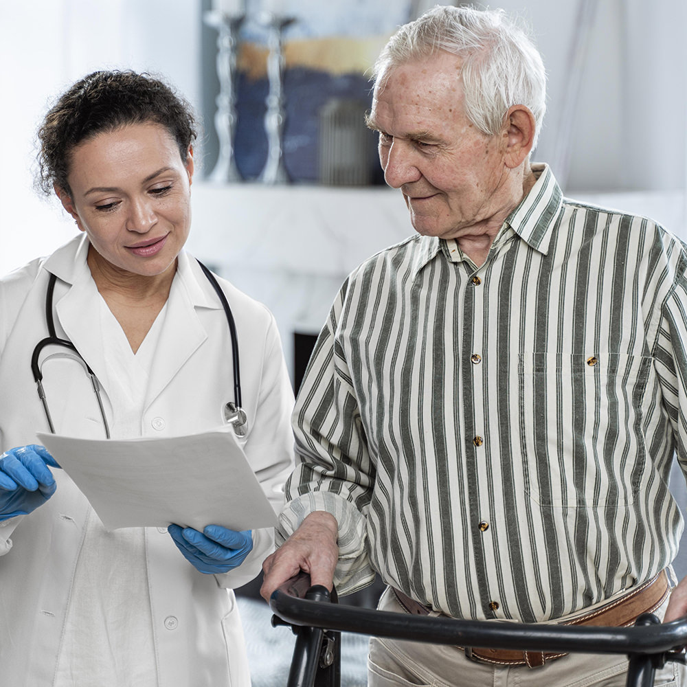 Doctor discussing medical report with her geriatric patient.