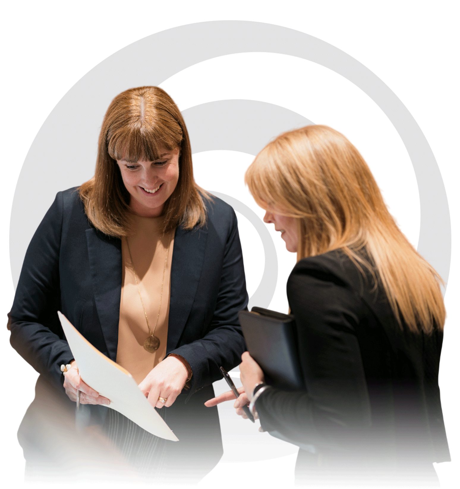 Two South Australian Medical Specialist team members looking at patient data.